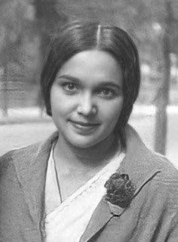 A vintage black and white portrait of Devika Rani, a pioneer of Indian cinema.