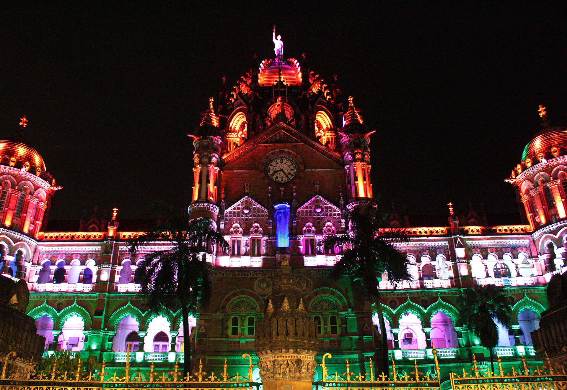 Chhatrapati Shivaji Maharaj Terminus station is beautifully lit at night in Mumbai, showcasing incredible Indian.